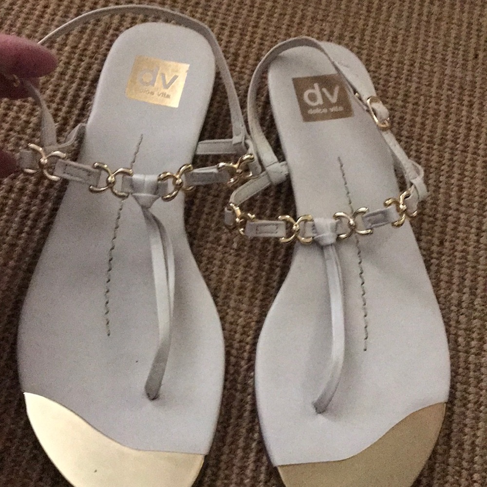 Cream sandals with bridle detail